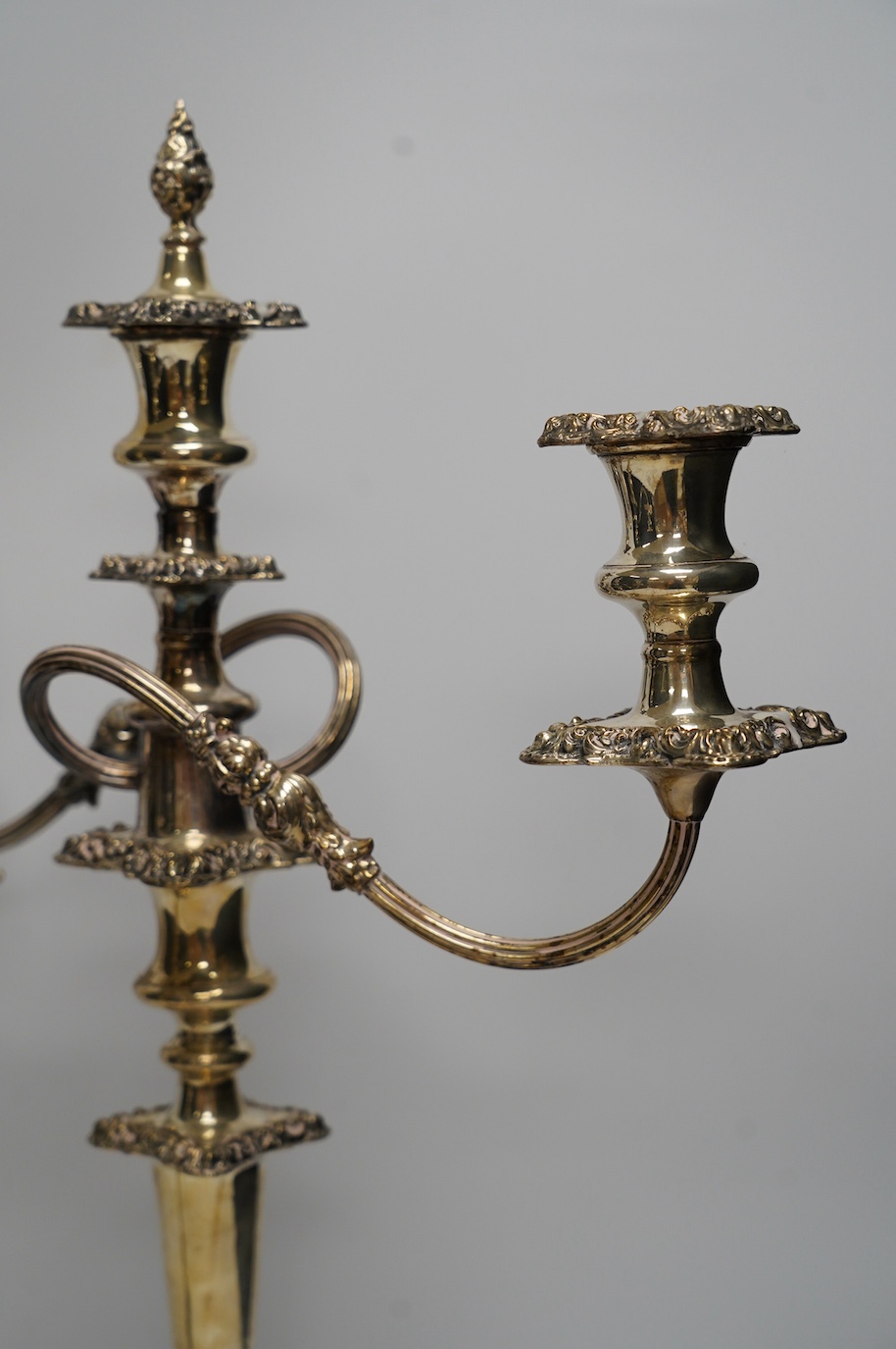 A pair of EPNS candelabra, 52cm high. Condition - fair to good